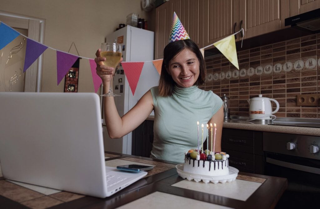 Lady celebrating birthday on a zoom call with friends